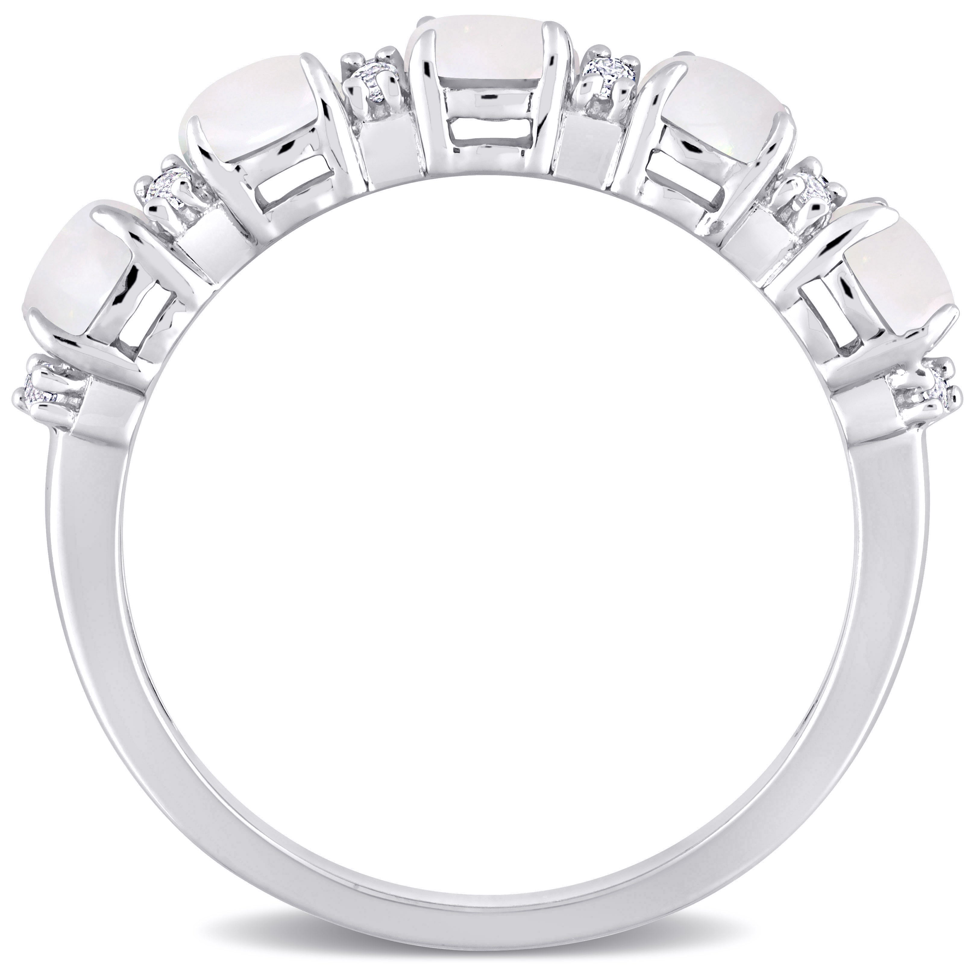 Sterling silver opal and white topaz ring by Delmar, angled view