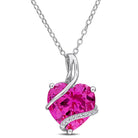 Pink sapphire heart pendant necklace in sterling silver by Delmar, front view