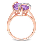 Sterling silver heart-wrapped ring with amethyst by Delmar, side angle
