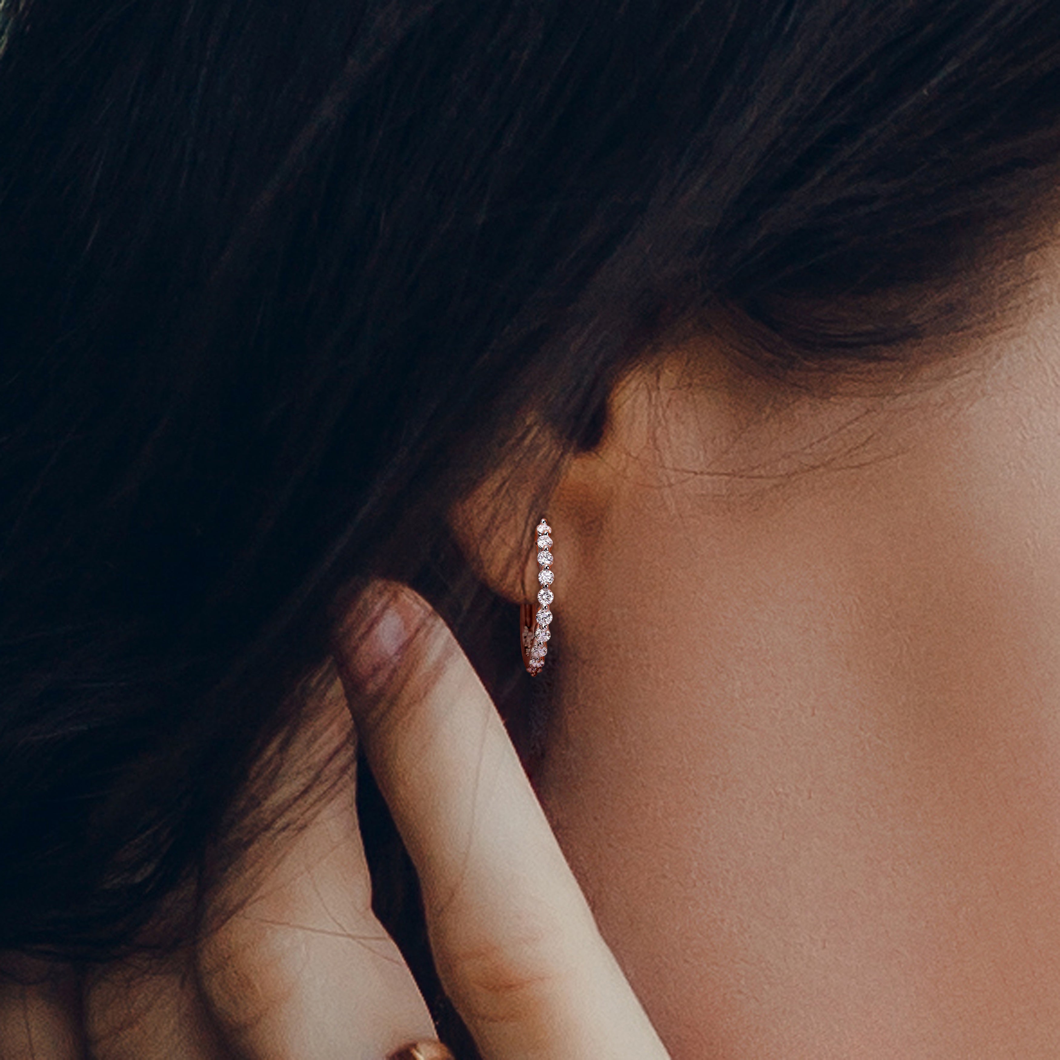 Lab-grown diamond hoop earrings worn, lifestyle view