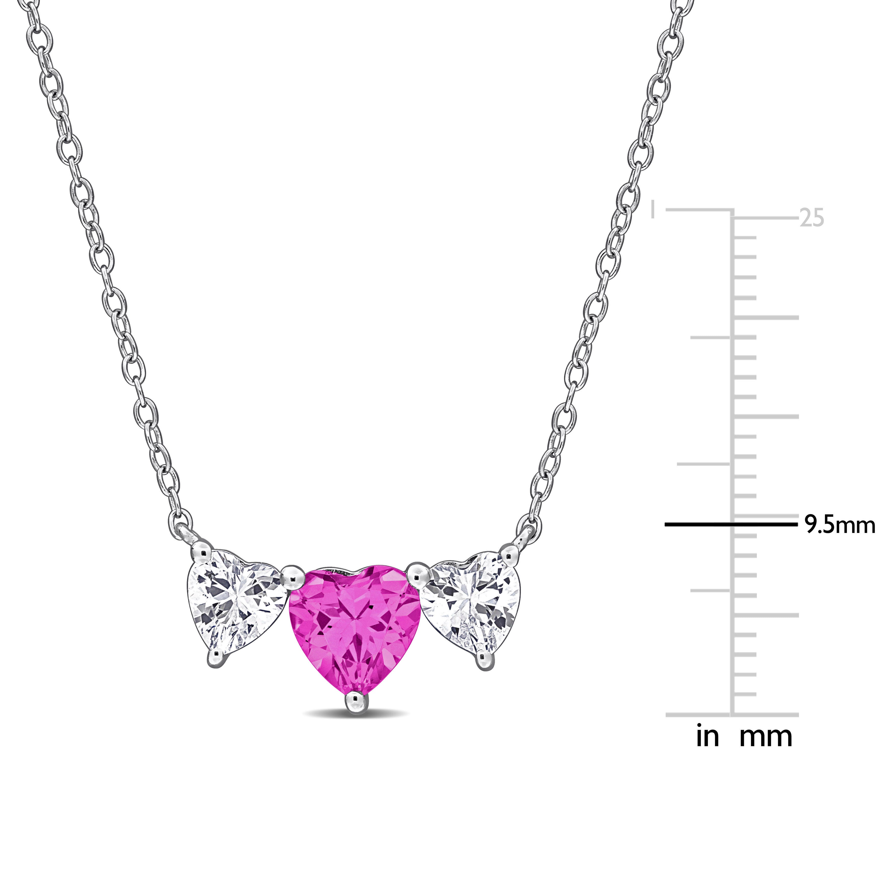 Close-up of pink and white sapphire heart pendant in sterling silver by Lord & Taylor