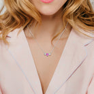 Triple-heart sapphire necklace worn on model, lifestyle view by Lord & Taylor