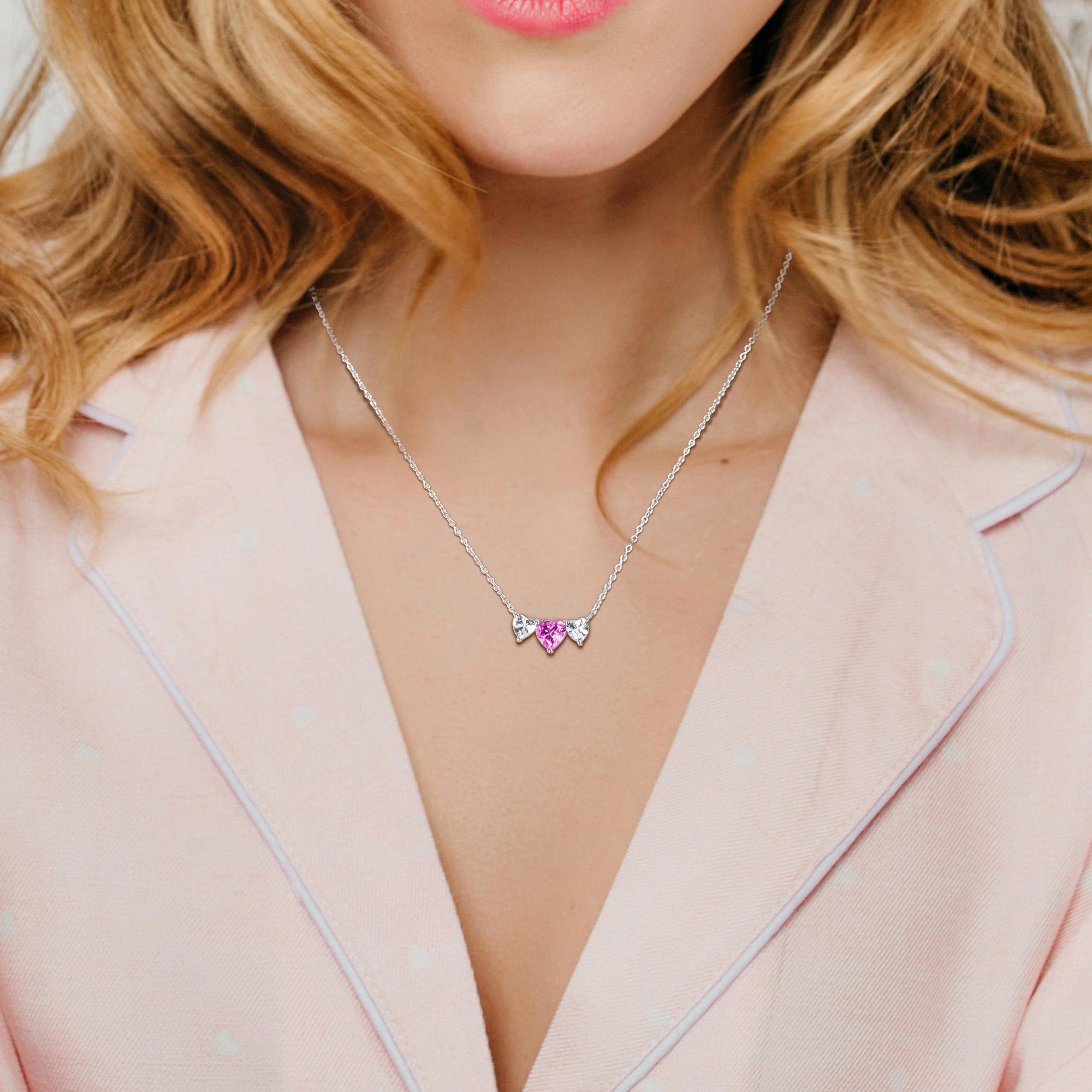 Triple-heart sapphire necklace worn on model, lifestyle view by Lord & Taylor