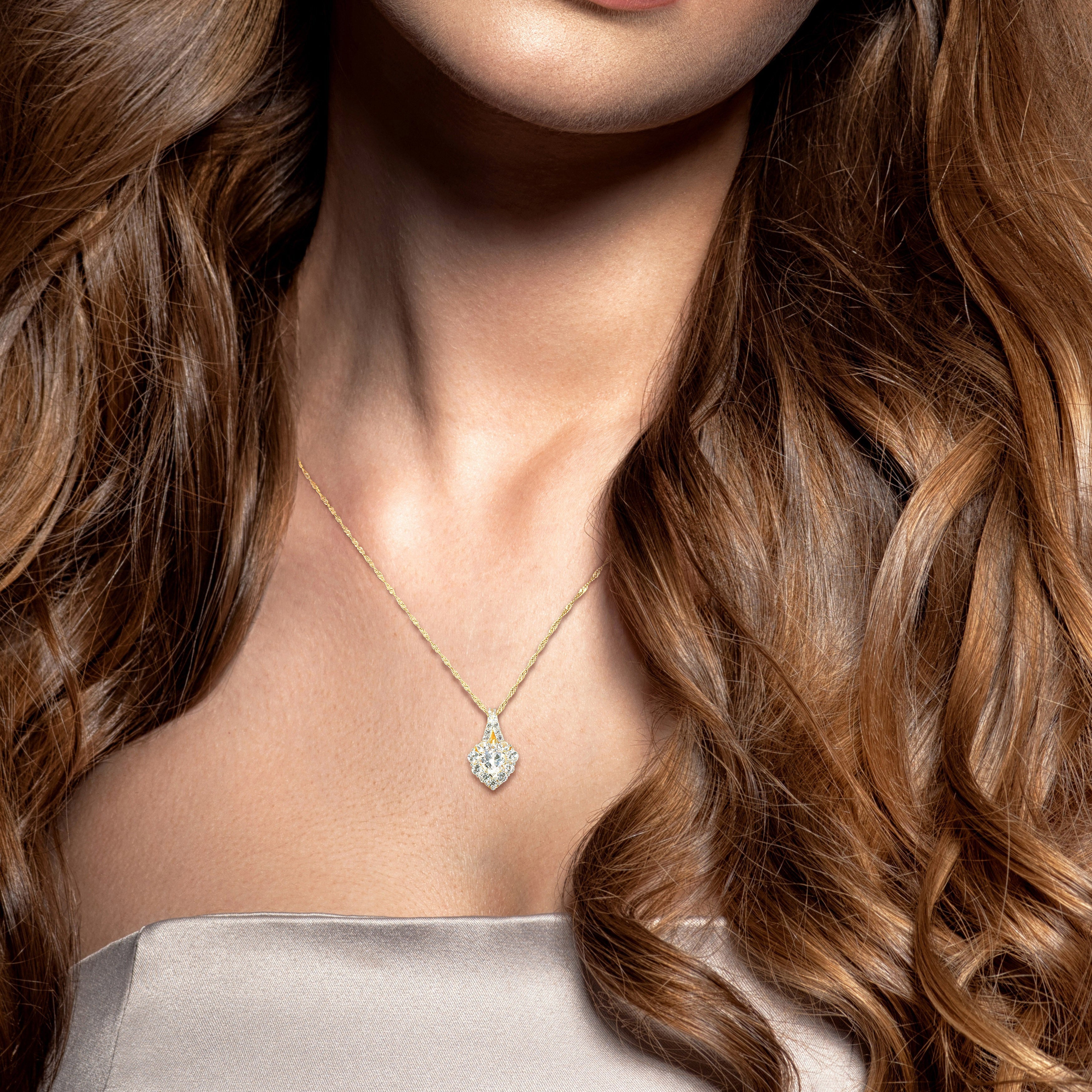 Heart pendant necklace worn on model showing 18-inch chain length by Lord & Taylor