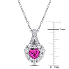 Pink sapphire heart pendant with prong-set white sapphires, close-up by Lord & Taylor