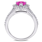 Pink sapphire heart halo ring in sterling silver by Delmar, diagonal view