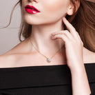 Yellow gold plated halo pendant necklace with white sapphire by Lord & Taylor, lifestyle view