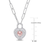 Close-up of heart-cut morganite gemstone with created white sapphire double halo in sterling silver by Delmar
