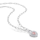 Morganite heart-lock pendant necklace in sterling silver, diagonal view showing double halo detail by Delmar