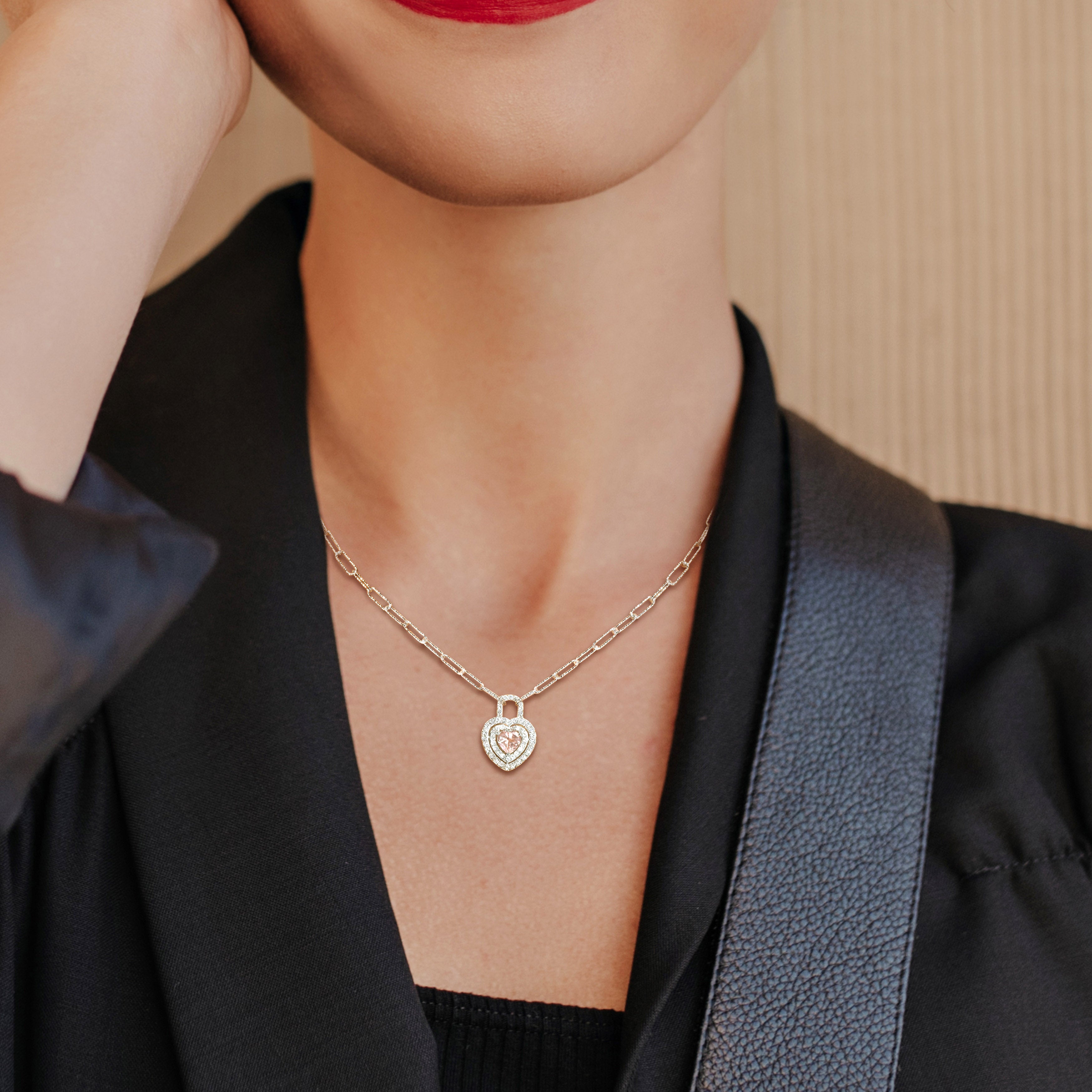 Pink morganite heart pendant necklace in sterling silver worn on model, lifestyle view by Delmar