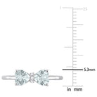 Close-up of heart-cut aquamarine and bezel-set diamonds on sterling silver ring by Lord & Taylor