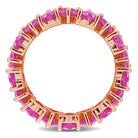 Pink sapphire heart eternity ring in rose-plated sterling silver, diagonal view by Lord & Taylor
