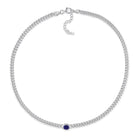 Blue sapphire pendant necklace by Delmar, detail view of bezel setting