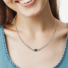 Sterling silver created emerald necklace worn, lifestyle view by Lord & Taylor