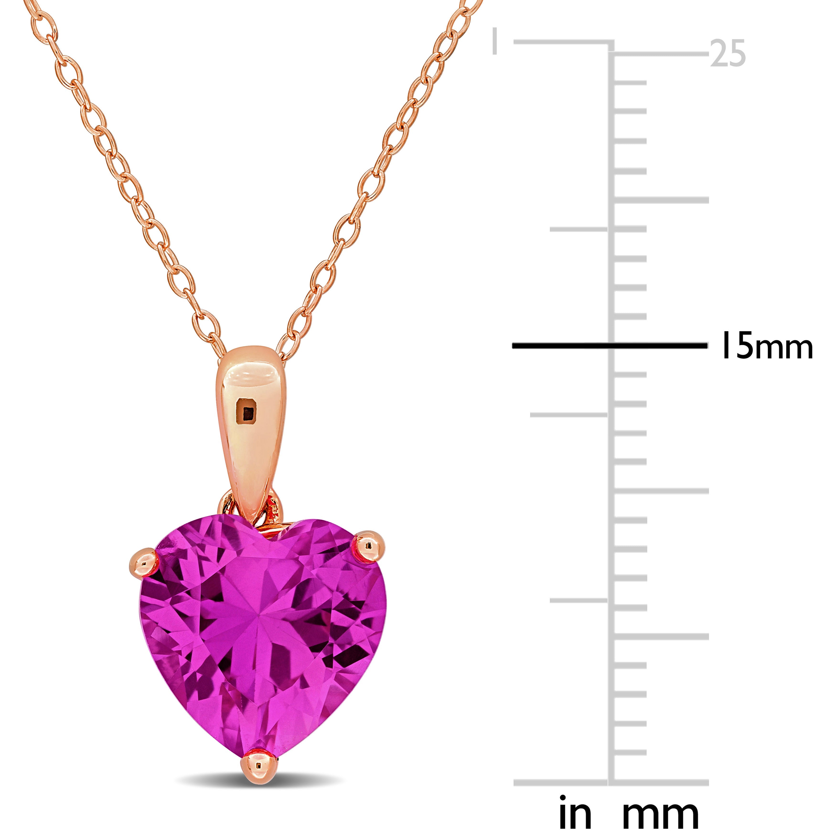 Pink sapphire heart pendant close-up showing rose-plated setting by Lord & Taylor