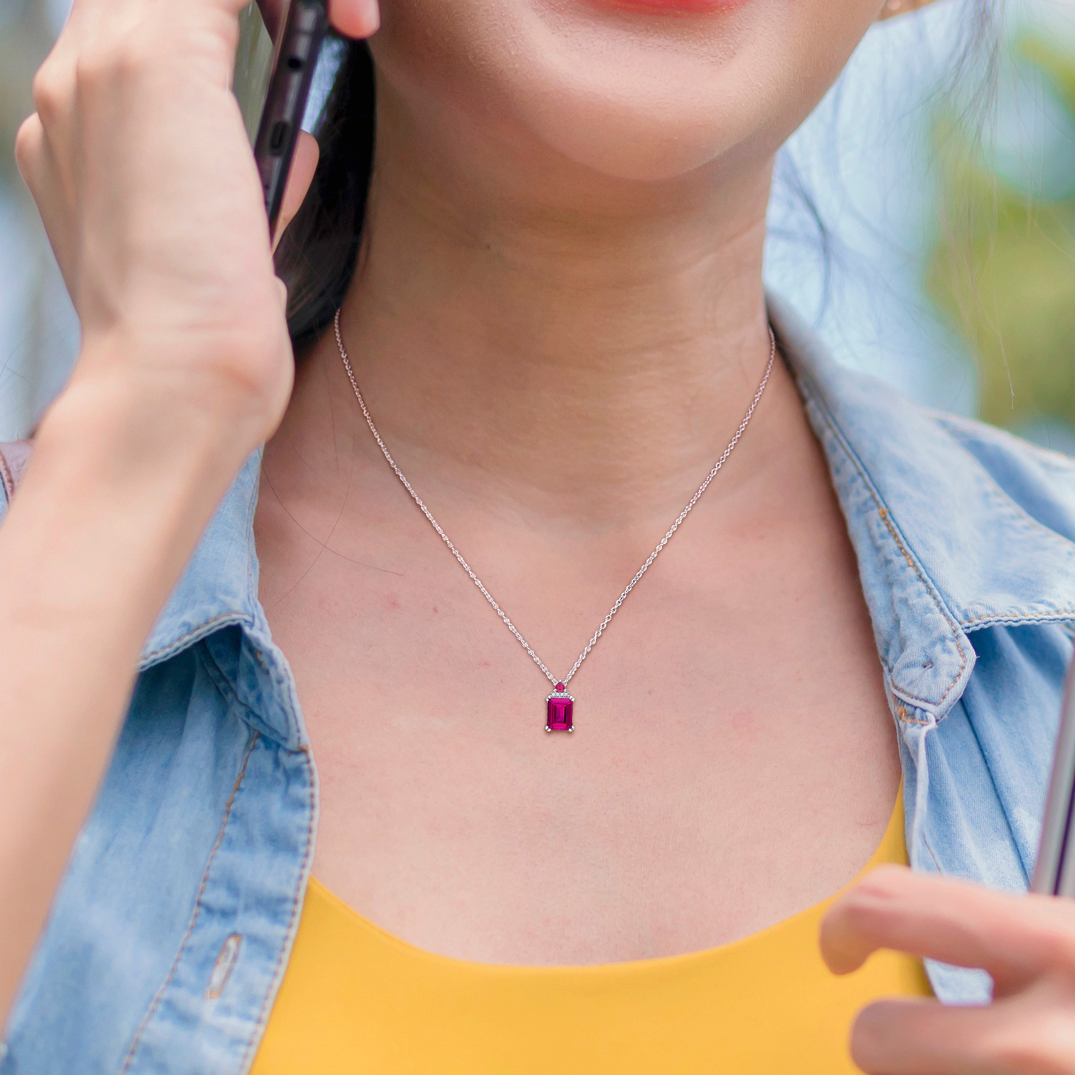 Pink topaz and ruby pendant necklace worn, lifestyle view