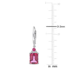 Close-up of octagon-cut pink topaz and trilliant-cut ruby with diamond accents
