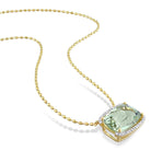 Green quartz pendant necklace with white topaz halo, detail of cushion-cut stone and prong setting by Lord & Taylor