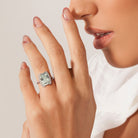 Green quartz and white topaz ring worn on hand by Lord & Taylor