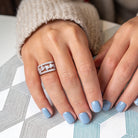 White sapphire heart ring in sterling silver worn on hand by Lord & Taylor