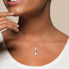 Blue topaz drop necklace worn on model by Lord & Taylor