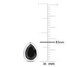 Black diamond pear stud earrings in 14k white gold by Delmar, close-up of bezel setting
