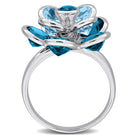 Blue topaz flower ring in sterling silver, diagonal angle view