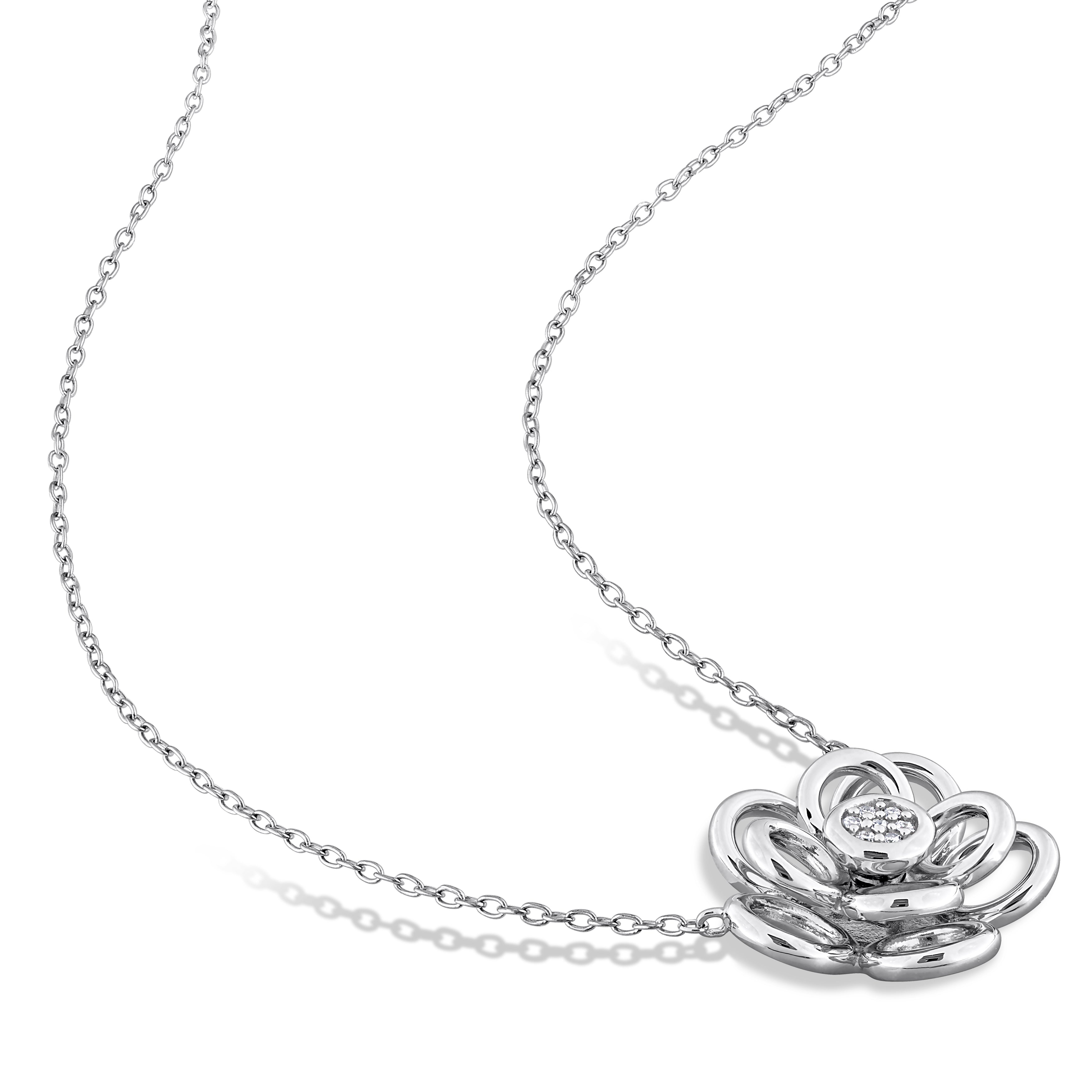 Diamond flower pendant necklace in sterling silver, detail of floral design