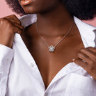 Sterling silver diamond flower pendant necklace worn on model
