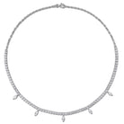 Created white sapphire charm necklace, detail view showing round-cut stones by Lord & Taylor