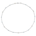 Lord & Taylor pearl and blue topaz necklace, detail view of gemstone stations