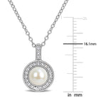 White pearl pendant necklace with topaz halo by Lord & Taylor, close-up of pearl and halo