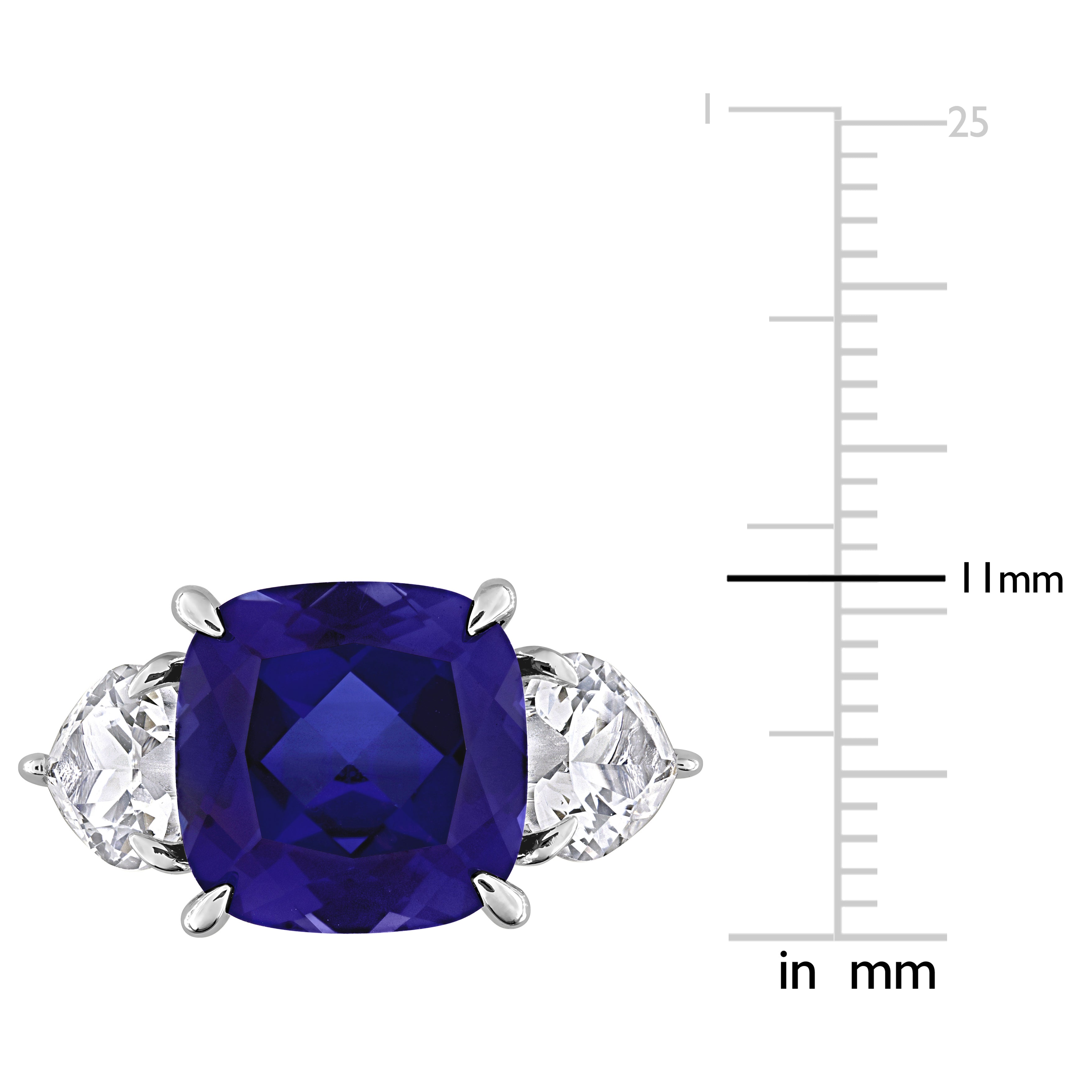 Blue sapphire three-stone ring in sterling silver by Lord & Taylor, close-up of gemstones
