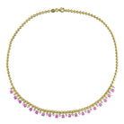 Pink and white sapphire necklace detail showing round gemstones by Lord & Taylor