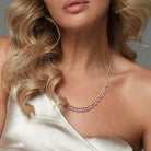 Pink and white sapphire necklace worn on model by Lord & Taylor