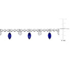 Detail view of created blue sapphire marquise stones and white sapphire accents by Lord & Taylor