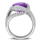 Purple amethyst cocktail ring with white topaz accents, diagonal overhead view