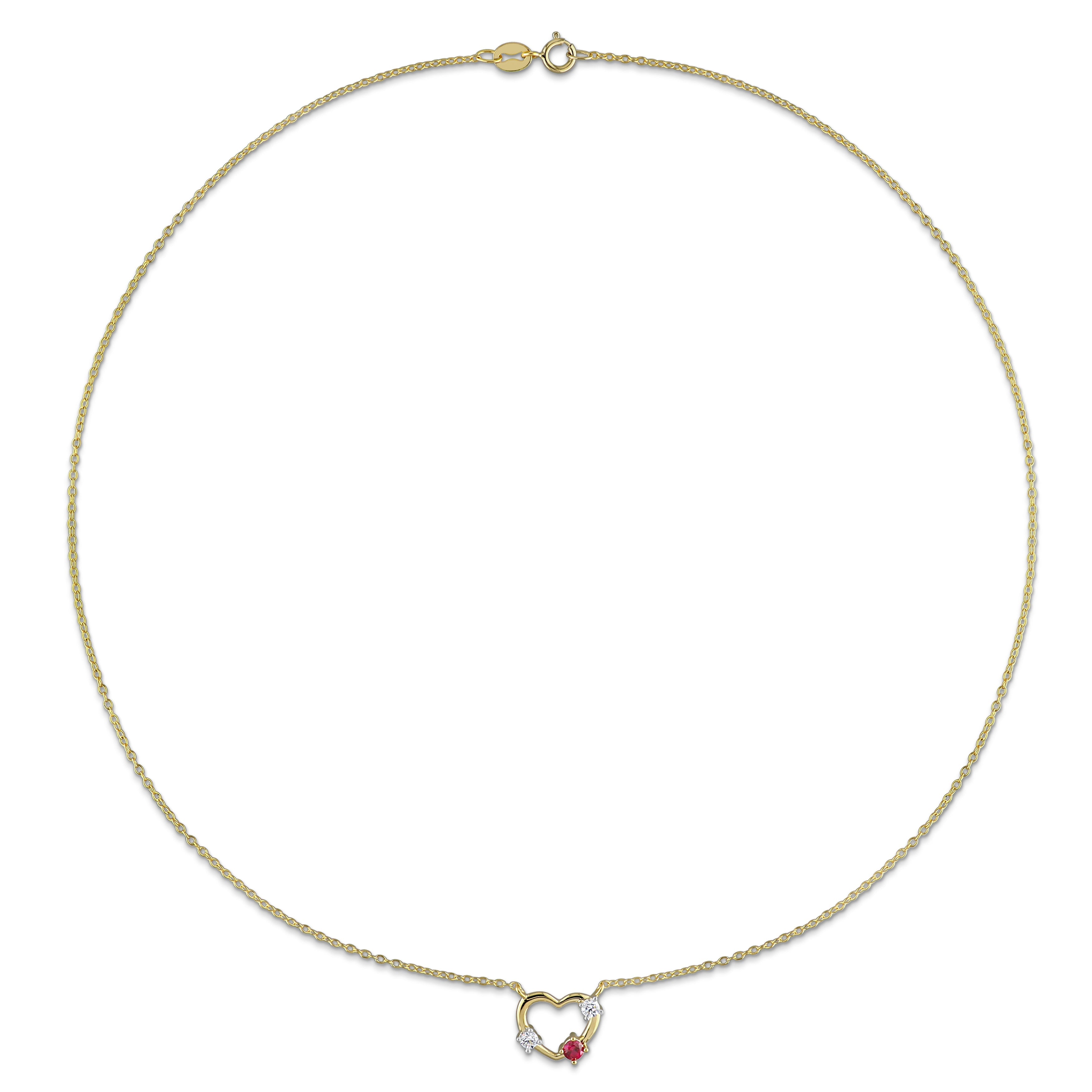 Yellow gold plated open heart pendant detail showing created ruby and lab-grown diamonds