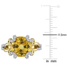 Close-up of cushion-cut citrine gemstone with white topaz frame by Lord & Taylor