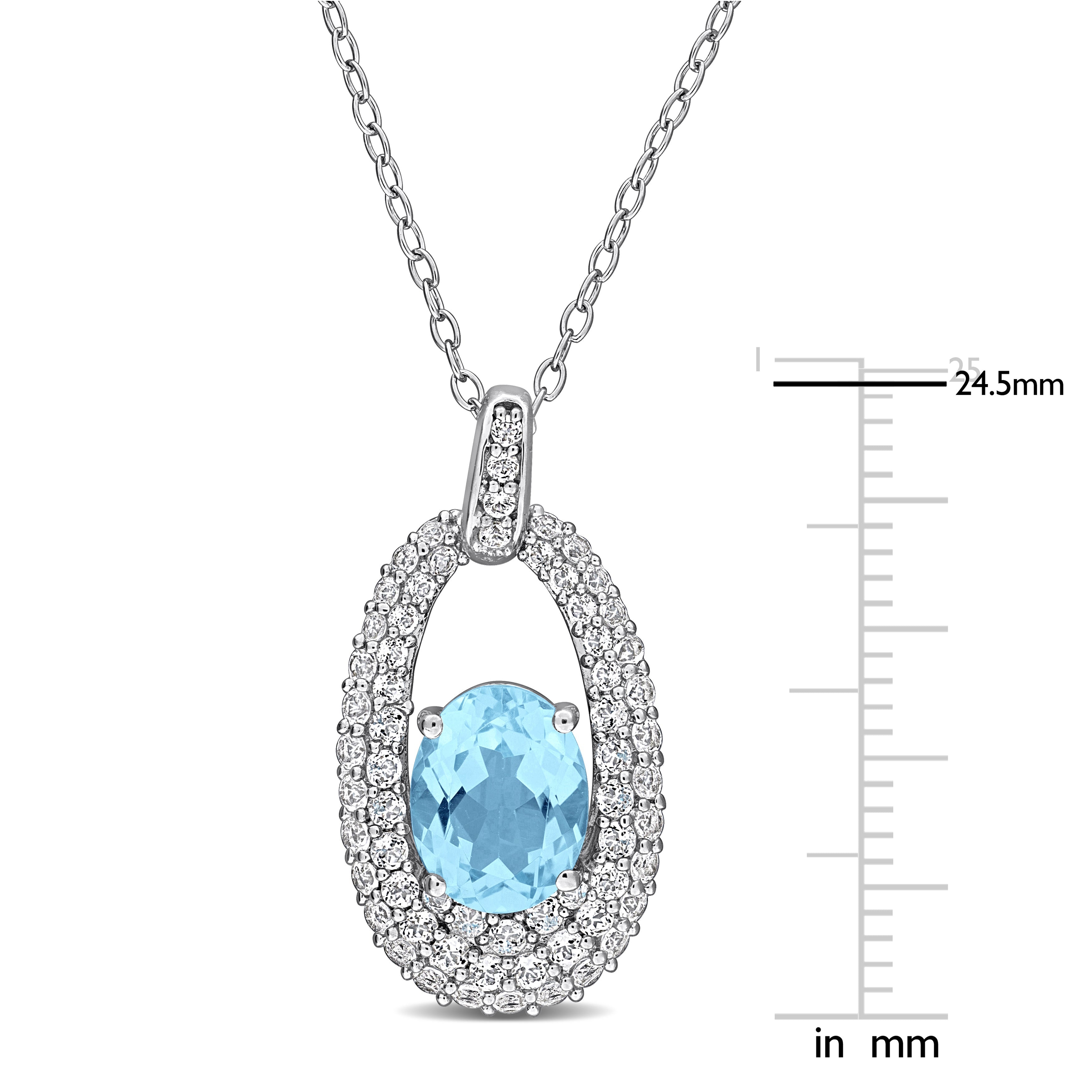 Blue topaz and white topaz pendant close-up showing high polish sterling silver finish by Lord & Taylor
