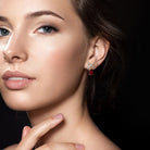 Lord & Taylor ruby bow drop earrings worn, lifestyle view