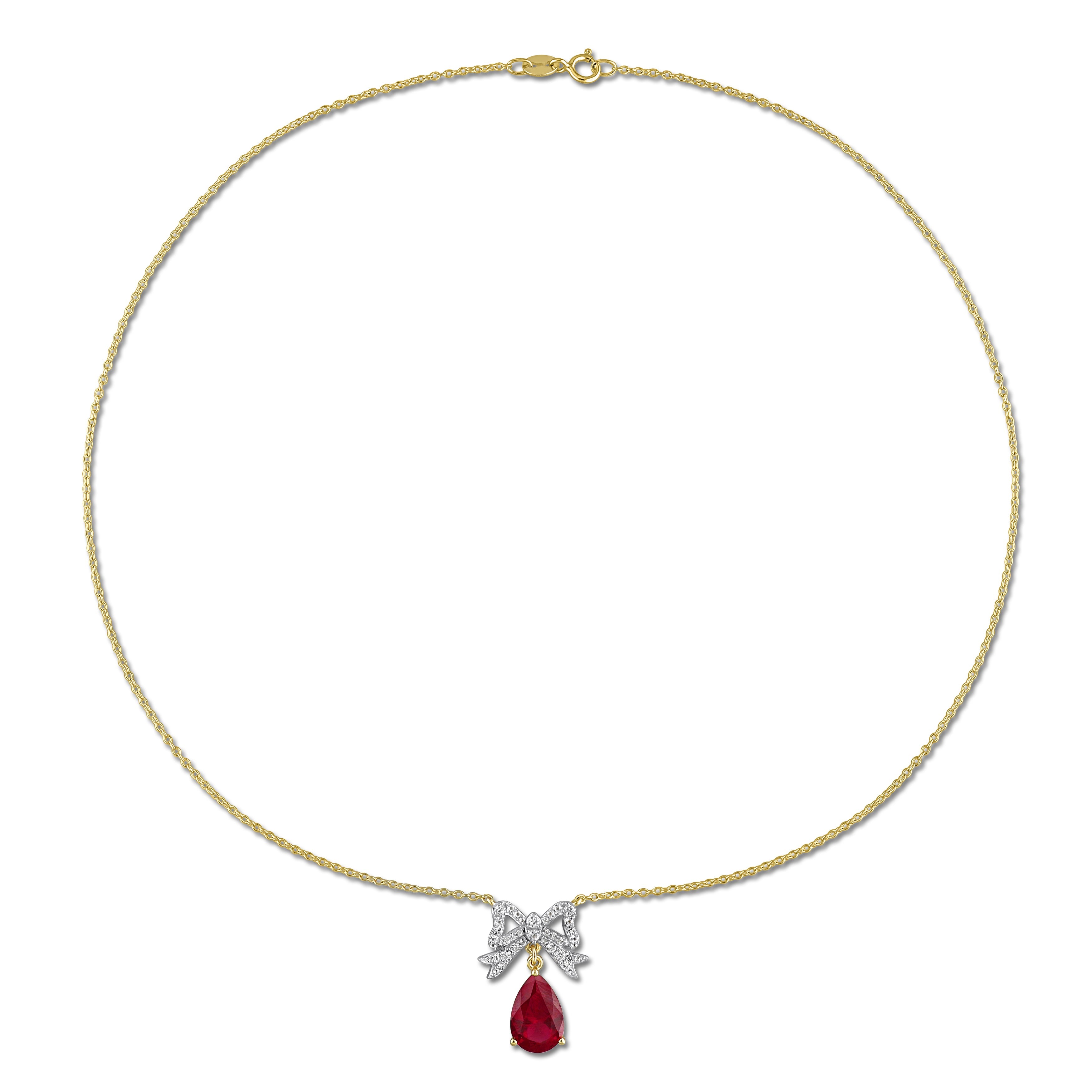 Yellow-plated bow necklace with created gemstones, detail view of pendant
