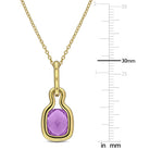 Natural amethyst gemstone pendant showing high polish finish, close-up by Lord & Taylor
