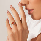 Citrine gemstone ring in yellow-plated sterling silver worn on hand by Lord & Taylor