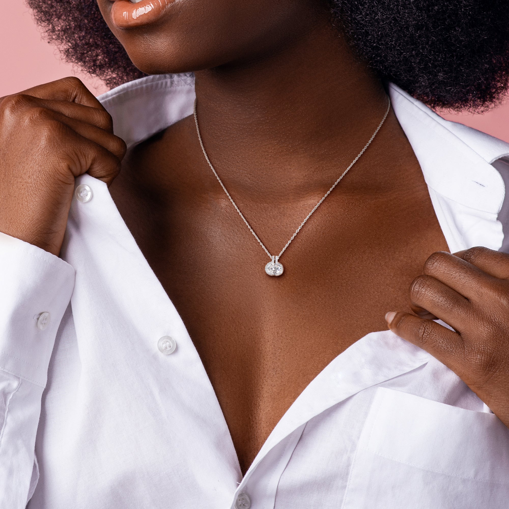 Sterling silver moissanite pendant necklace by Lord & Taylor, worn lifestyle view