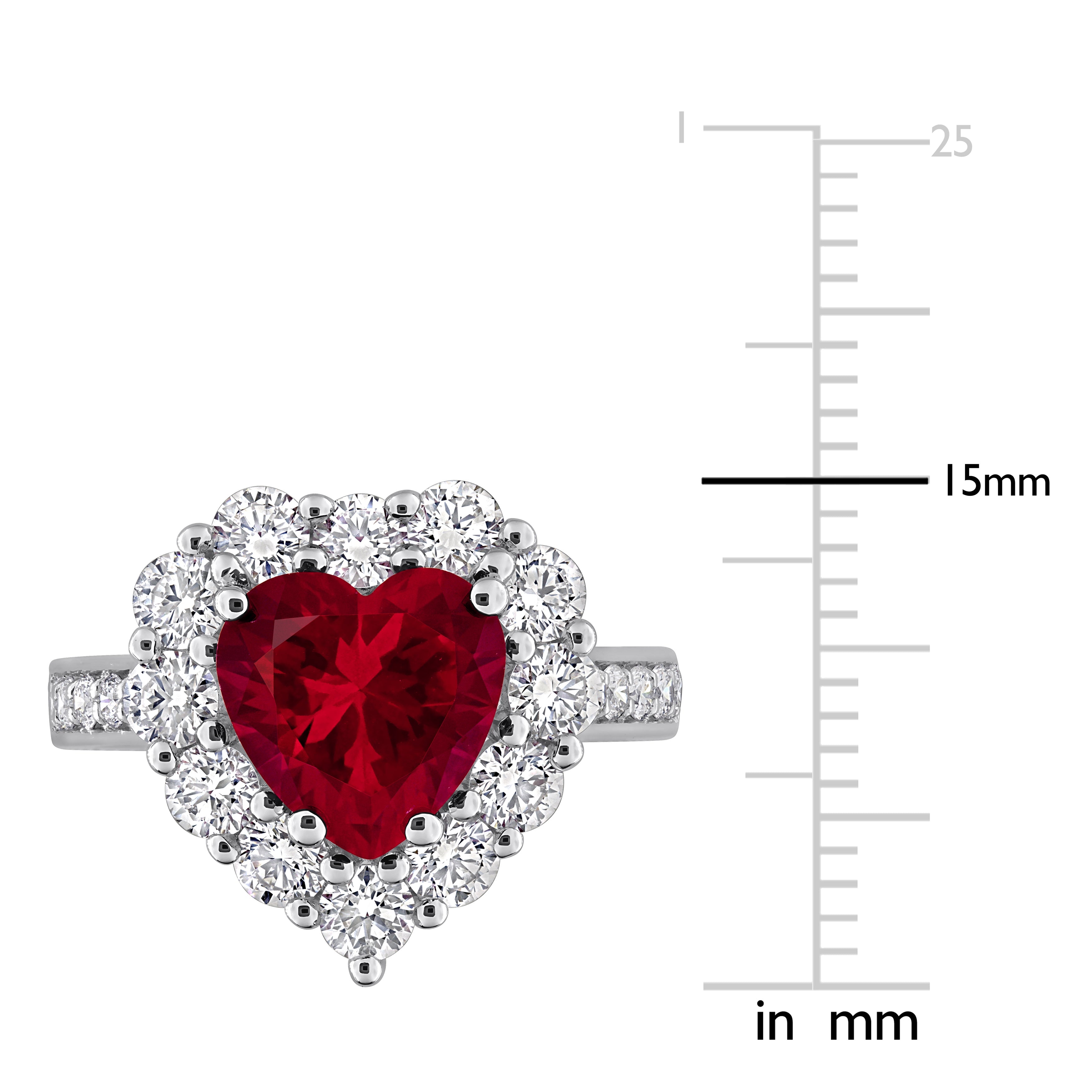 Red ruby heart halo ring close-up showing diamond surround detail