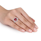 Red ruby heart halo ring in sterling silver, side profile view