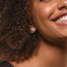 Lab-grown diamond cluster stud earrings worn on ear, lifestyle view