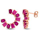 Rose-plated sterling silver curved drop earrings with rhodolite and ruby gemstones, front view by Lord & Taylor