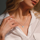 Citrine pear-cut solitaire necklace worn on model showing 17-inch chain length by Lord & Taylor